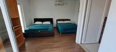 a room with two beds in a room at Vila Arb in Ulcinj