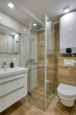 a bathroom with a shower and a toilet and a sink at Pearl of Budva in Budva