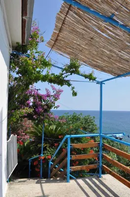 a view of the ocean from a house at Sunset in Ulcinj
