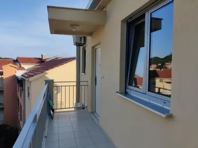 a balcony with a view of the city at Good morning Petrovac in Petrovac na Moru
