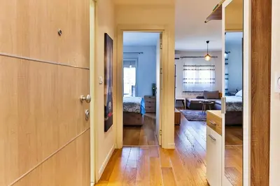 a hallway leading to a living room and a bedroom at Apartment Alex in Bar