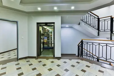 an empty room with a staircase and a door at Apartment Alex in Bar
