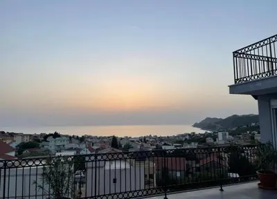 a view of the ocean from a balcony of a building at Villa Roki in Ravanj