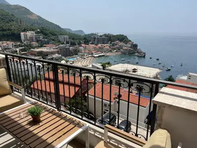 a balcony with a view of the ocean at Lux Apartment Kamenovo in Sveti Stefan