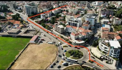 an aerial view of a city with a highway at Apartman Sofija Budva in Budva