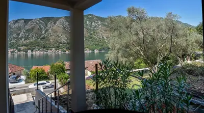 a view of a lake from a house at Java apartments - S & J in Dobrota