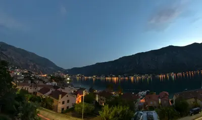 a view of a town and a body of water at Java apartments - S & J in Dobrota