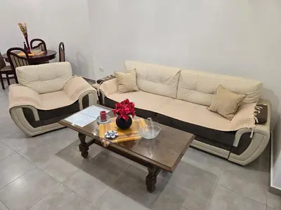 a living room with a couch and a coffee table at Apartment Angel in Kotor