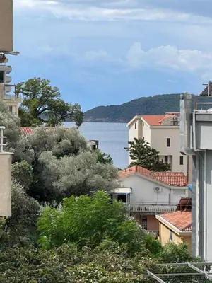 a view of the water from a city at Belveder Alevtina in Rafailovici