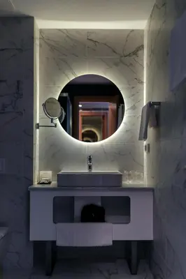 a bathroom with a sink and a mirror at HOTEL AGAPE in Bar