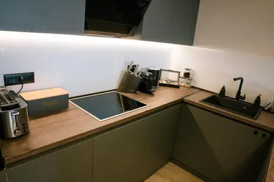 a kitchen with a sink and a counter top at Luxury Apartment Budva in Budva