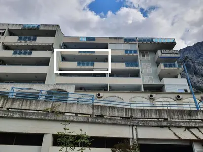 a large building with windows on the side of it at BLUE EYES SAILORS in Kotor