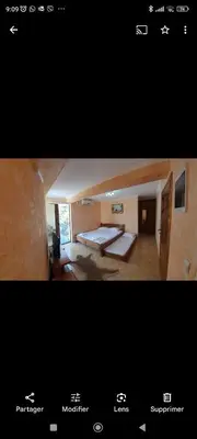 two pictures of a room with a bed in a room at Villa M in Dobra Voda