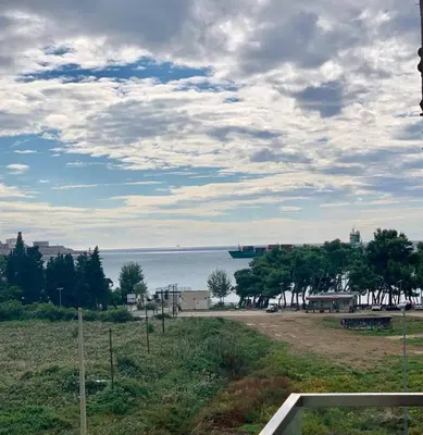 a view of the ocean with a ship in the distance at Corall apartment Bar in Bar