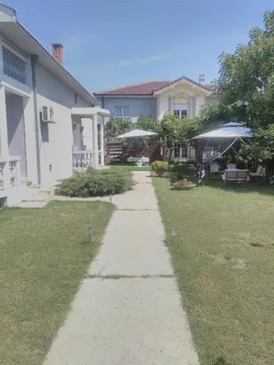 a walkway in front of a house at Prima House in Podgorica