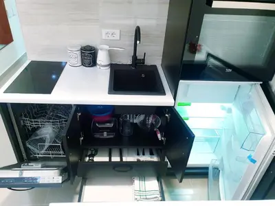 a kitchen with a sink and a counter top at LUX Apartment - Central Place Bar in Bar