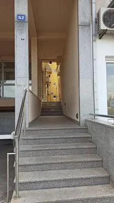 a stairway of a building with stairs in front at Martha`s place Drač in Podgorica
