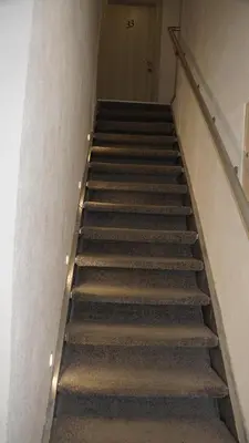 a staircase in a building with a bunch of stairs at Villa Stanivukovic in Budva
