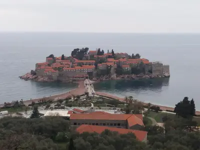 a resort on an island in the water at Apartments Muhar in Sveti Stefan
