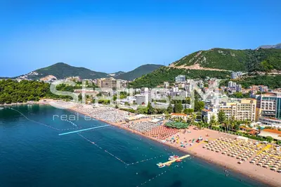an aerial view of a beach and buildings at Status-M Apartments 102 in Becici