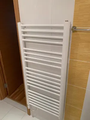 a white door in a bathroom next to a shower at Panorama Bar 2 bedroom in Bar