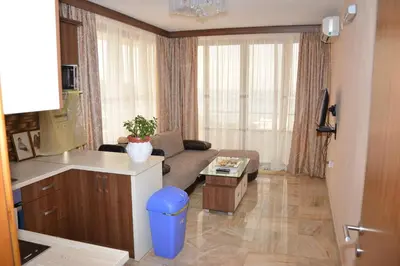 a living room with a couch and a table at Guest House Evropa 2 in Ulcinj