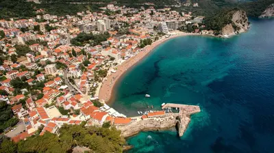 an aerial view of a city and a beach at Apartments Viktorija in Petrovac na Moru