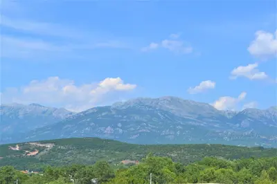 a view of a mountain range with mountains in the background at Villa Gabriela in Kotor