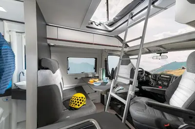an interior view of an rv with a table in it at Camper Montenegro and Recreational Vehicles in Budva