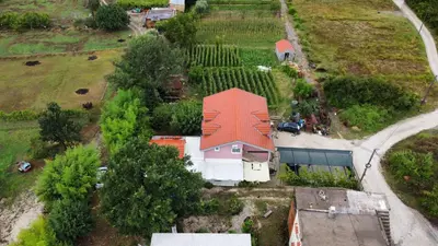 an aerial view of a house with a red roof at Apartman Balsa in Kotor