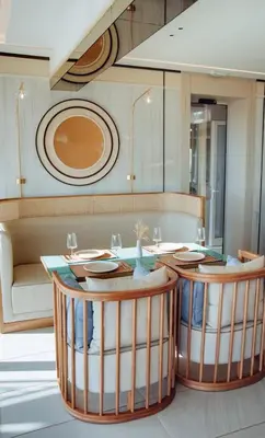a dining room with a table and a couch at Status-M Apartments 134 in Becici
