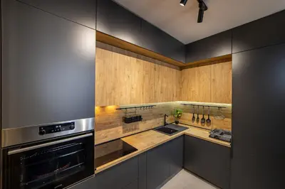 a kitchen with a sink and a stove at Apartments 28 Master Quart in Podgorica