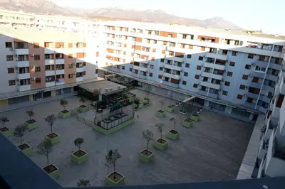 an overhead view of a courtyard with trees and buildings at Exclusive studio, great location in Podgorica