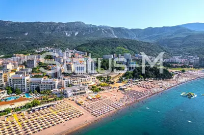 an aerial view of a beach with hotels and buildings at Status-M Apartments 135 in Becici
