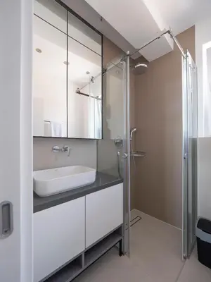 a bathroom with a sink and a shower at Horizon-Two Bedroom Apartment Partial Sea View Charlene in Becici