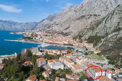 a town on the side of a mountain at Apartman J&I in Kotor