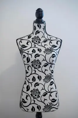 a black and white vase with a floral pattern at Apartman J&I in Kotor
