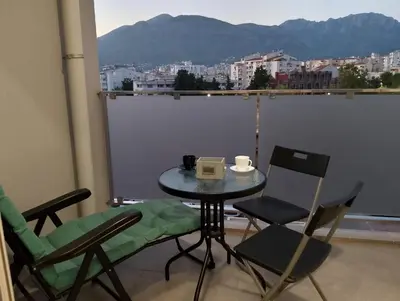 a table and chairs on a balcony with a view at M & A Apartment Bar A 29 in Bar