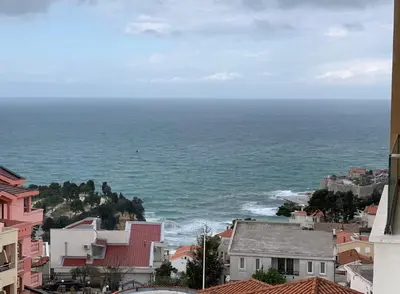 a view of the ocean from a city at Art's Apartment mit Pool Ulcinj Pinjes in Ulcinj