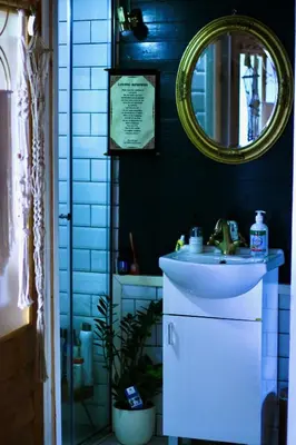 a bathroom with a sink and a mirror at Zen House for 2 in Ulcinj