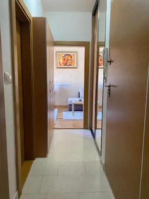 a hallway with a door leading to a room at Apartman Bojanic in Podgorica