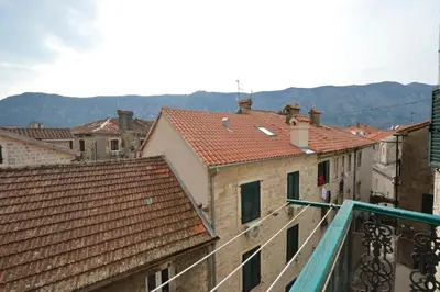 a view from the balcony of a city with roofs at Sofija Apartment in Kotor
