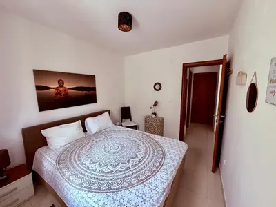 a bedroom with a bed in a room at Apartment 