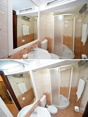 a bathroom with a sink and a tub and a toilet at Apartment Amigo Old Town Kotor in Kotor
