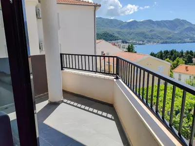 a balcony with a view of the water at Sea view apartment in Becici in Budva