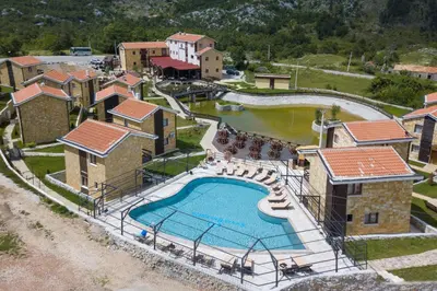 an aerial view of a pool at a resort at Ethno Village St George in Cetinje