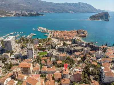 an aerial view of the city of dubrovnik and the ocean at Apartment With a View in Budva