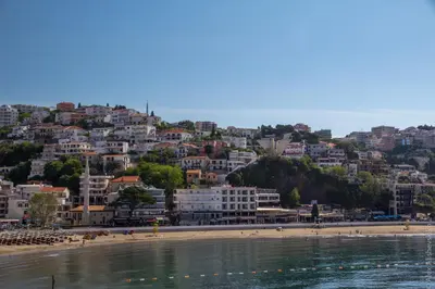 a view of a beach and a city with buildings at Apartman LOKI in Ulcinj