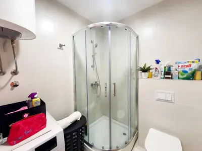 a bathroom with a shower with a glass shower stall at Apartman Ana Lux in Podgorica