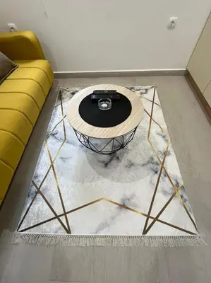 a coffee table on a rug in a living room at Dolce Casa in Kotor